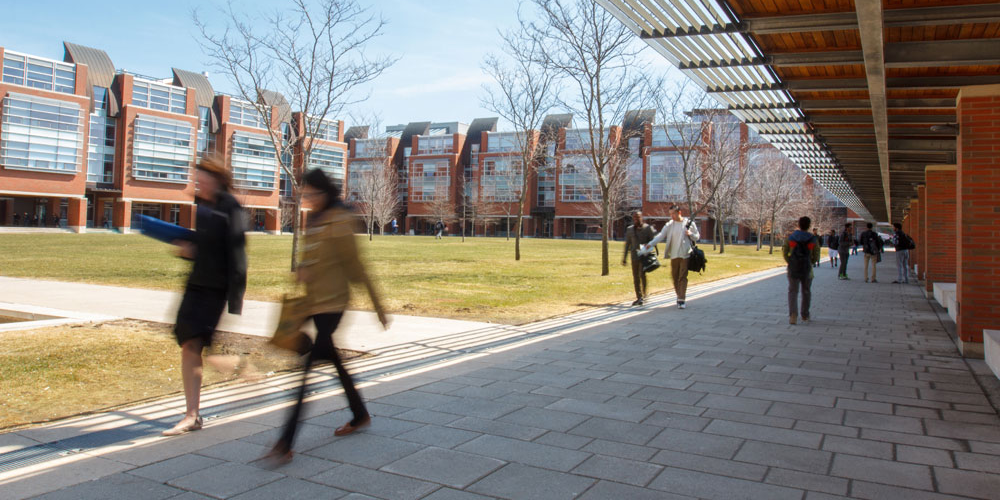 Students walking in Polonsky Commons
